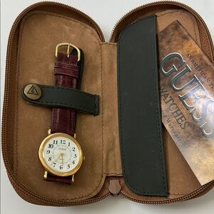 Vintage Guess Women's Watch with Gold Accents and a Burgundy Leather Band w/case